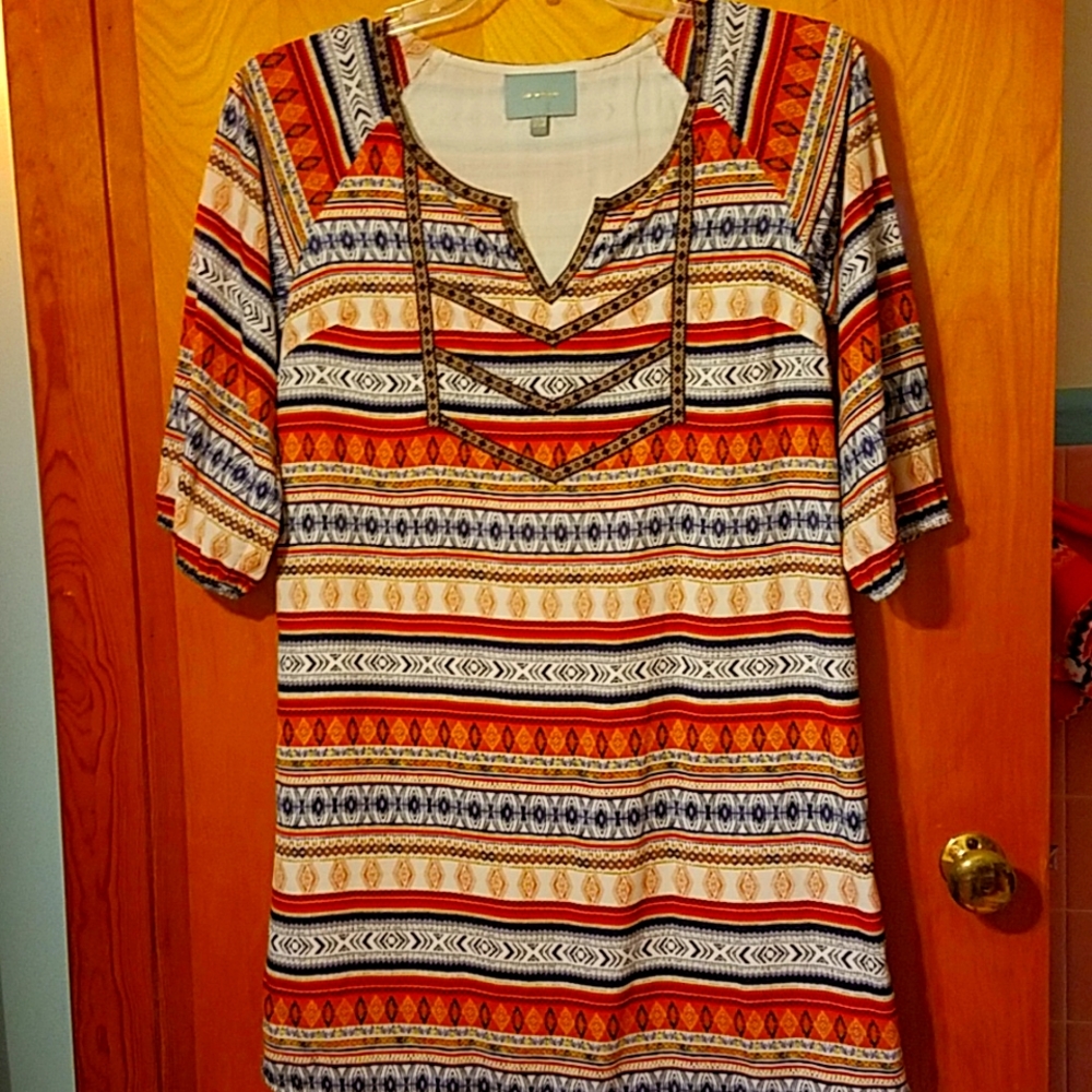 Skies Are Blue size S ladies mini dress with 3/4 sleeves with elastic.